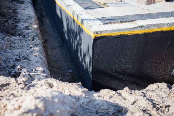 Professional Exterior Waterproofing technician working in Raymond, OH